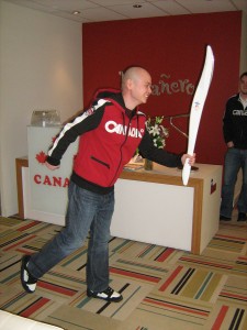 Sing with the Olympic Torch at the office.